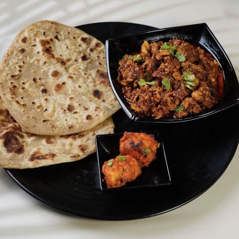 Indian comfort meal with flatbread and curry
