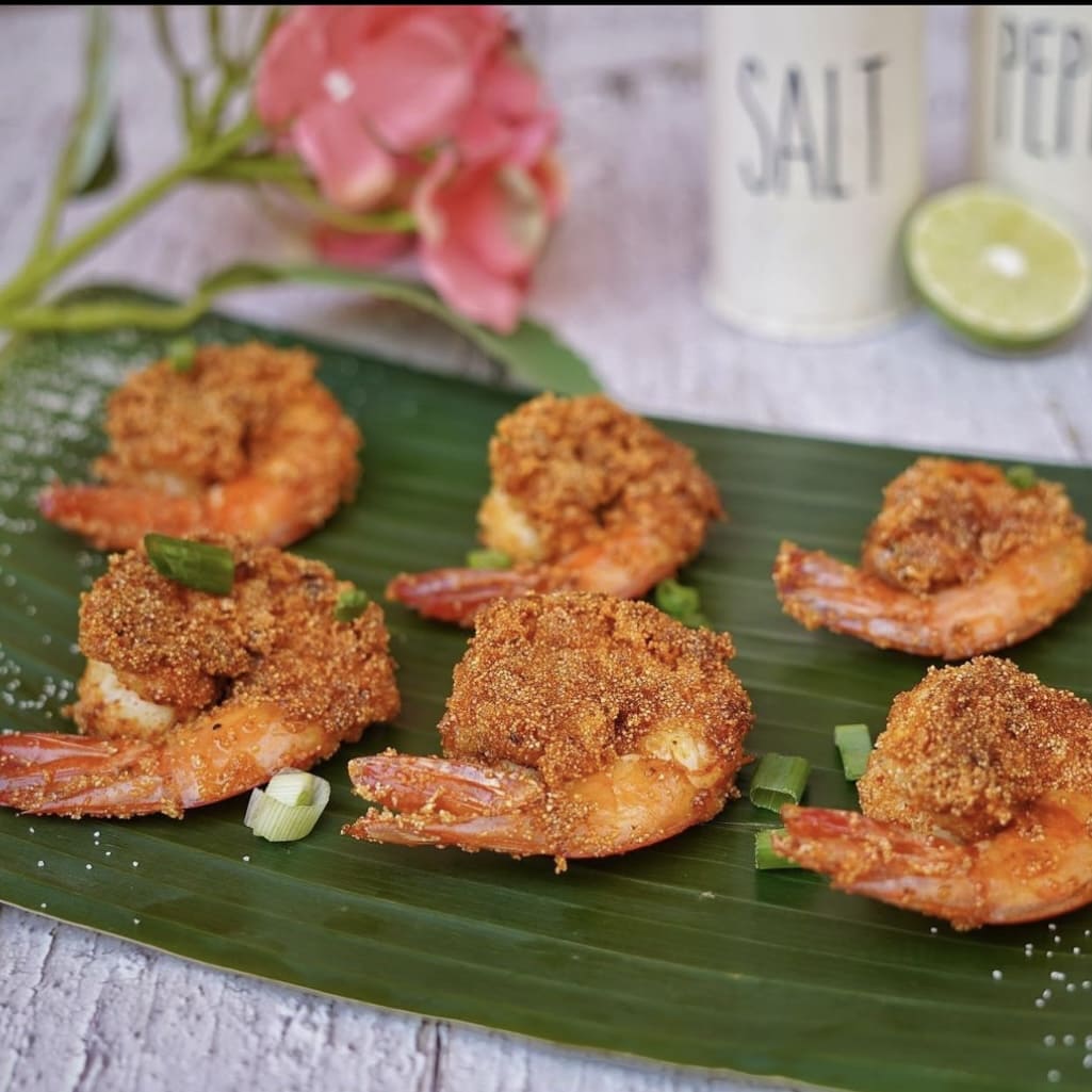 Crisp prawns served on a banana leaf